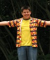 Free Stock Photo: A latino teen boy in a colorful shirt playing outdoors