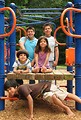 Free Stock Photo: A group of latino kids posing on a playground