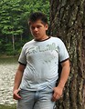 Free Stock Photo: A young latino man posing by a lake