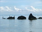 Free Stock Photo: Rocks on a calm ocean