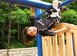 Free Stock Photo: A young latino boy playing on a playground
