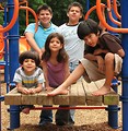 Free Stock Photo: A group of latino kids posing on a playground