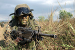 Free Stock Photo: US soldier with an M249 in the grass