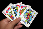 Free Stock Photo: A hand holding the four Jacks in a standard deck of cards