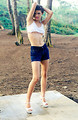 Free Stock Photo: A beautiful woman posing in a tank top outdoors