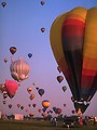 Free Stock Photo: Hot air balloons taking off from a field