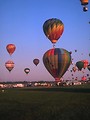 Free Stock Photo: Hot air balloons taking off from a field