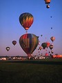 Free Stock Photo: Hot air balloons taking off from a field