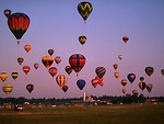 Free Stock Photo: Hot air balloons taking off from a field