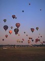 Free Stock Photo: Hot air balloons taking off from a field