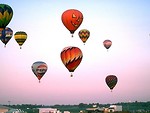 Free Stock Photo: Hot air balloons taking off from a field