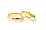 Free Stock Photo: A pair of wedding rings isolated on a white background.