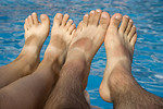 Free Stock Photo: Feet dangling over water