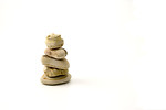 Free Stock Photo: A pile of small rocks stacked on top of each other isolated on a white background