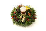 Free Stock Photo: An advent wreath with a white candle isolated on a white background