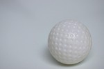 Free Stock Photo: A plastic golf ball isolated on a white background