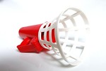 Free Stock Photo: A plastic ball catcher toy isolated on a white background