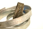 Free Stock Photo: Metal hose clamps on a white background