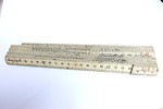 Free Stock Photo: A fold up ruler isolated on a white background.