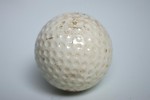 Free Stock Photo: A golf ball isolated on a white background