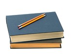 Free Stock Photo: A stack of books and pencils isolated on a white background