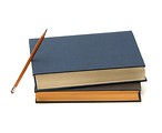 Free Stock Photo: A stack of books and a pencil isolated on a white background