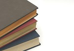 Free Stock Photo: A stack of books isolated on a white background