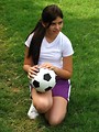 Free Stock Photo: A beautiful teen latina girl posing with a soccer ball