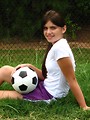 Free Stock Photo: A beautiful teen latina girl posing with a soccer ball