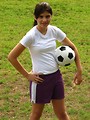 Free Stock Photo: A beautiful teen latina girl posing with a soccer ball