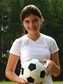 Free Stock Photo: A beautiful teen latina girl posing with a soccer ball