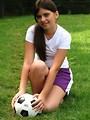 Free Stock Photo: A beautiful teen latina girl posing with a soccer ball
