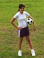Free Stock Photo: A beautiful teen latina girl posing with a soccer ball