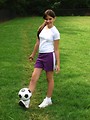 Free Stock Photo: A beautiful teen latina girl posing with a soccer ball