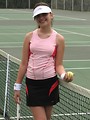 Free Stock Photo: A beautiful teen latina girl posing with tennis gear