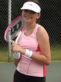 Free Stock Photo: A beautiful teen latina girl posing with tennis gear