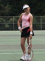 Free Stock Photo: A beautiful teen latina girl posing with tennis gear