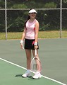 Free Stock Photo: A beautiful teen latina girl posing with tennis gear