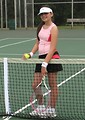Free Stock Photo: A beautiful teen latina girl posing with tennis gear