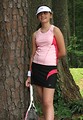 Free Stock Photo: A beautiful teen latina girl posing with tennis gear