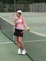 Free Stock Photo: A beautiful teen latina girl posing with tennis gear