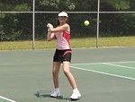 Free Stock Photo: A beautiful teen latina girl hitting a tennis ball