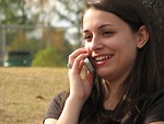 Free Stock Photo: Teenage girl talking on a cell phone