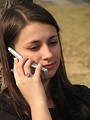 Free Stock Photo: Teenage girl talking on a cell phone