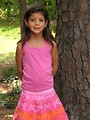 Free Stock Photo: A young latina girl posing outdoors by a tree