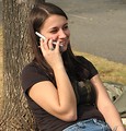 Free Stock Photo: Teenage girl talking on a cell phone