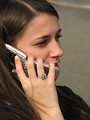 Free Stock Photo: Closeup of teenage girl talking on a cell phone