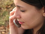 Free Stock Photo: Closeup of a teen girl talking on a cell phone.