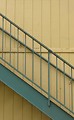 Free Stock Photo: Steps on the side of a yellow building