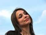 Free Stock Photo: Closeup of a teen girl with a blue sky